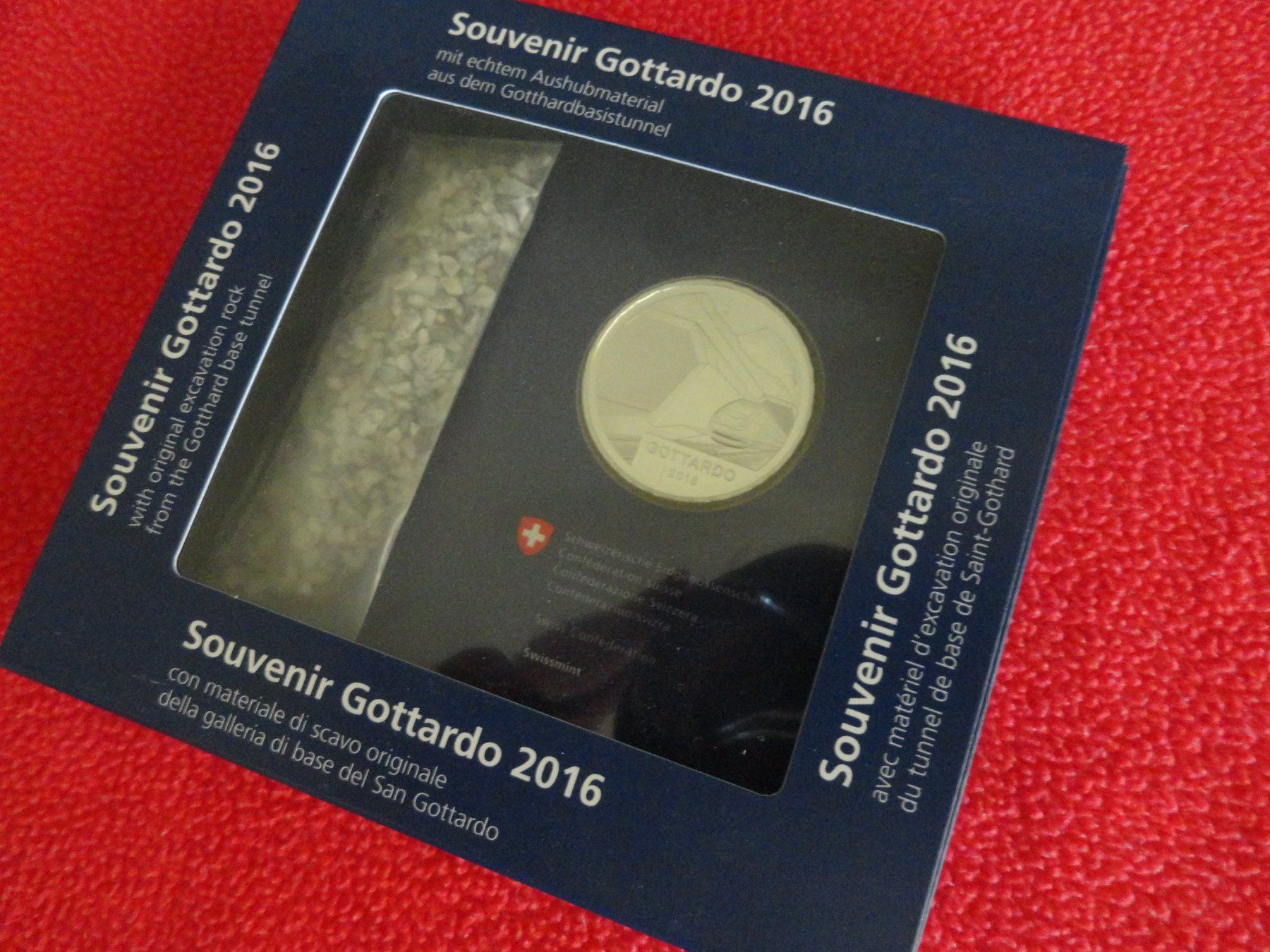 Tutti le monete: Souvenir Gottardo Silber 20 Fr. und echtem Aushubmaterial – Nuovo e nell'imballaggio originale da Gerlafingen venduto da Shiva_74 1