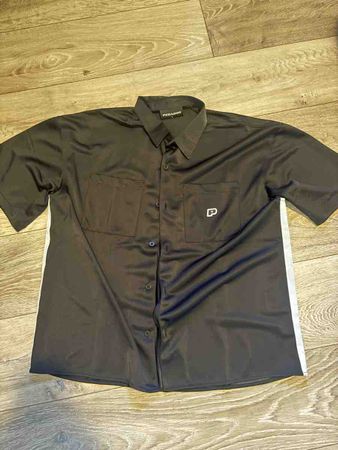Chemise à manches courtes Pegador noire, état neuf