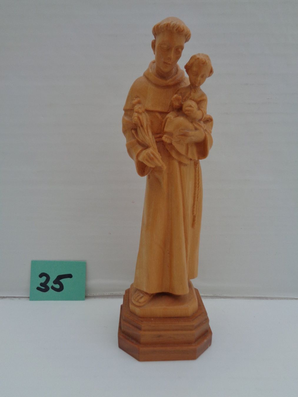 Statuette: Heiliger Antonius mit Kind aus Holz geschnitzt – Usato da Chur venduto da omonia