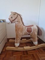 cheval à bascule musical