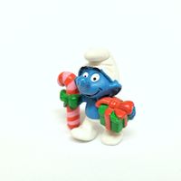 Weihnachts-Schlumpf mit Stock und Paket
