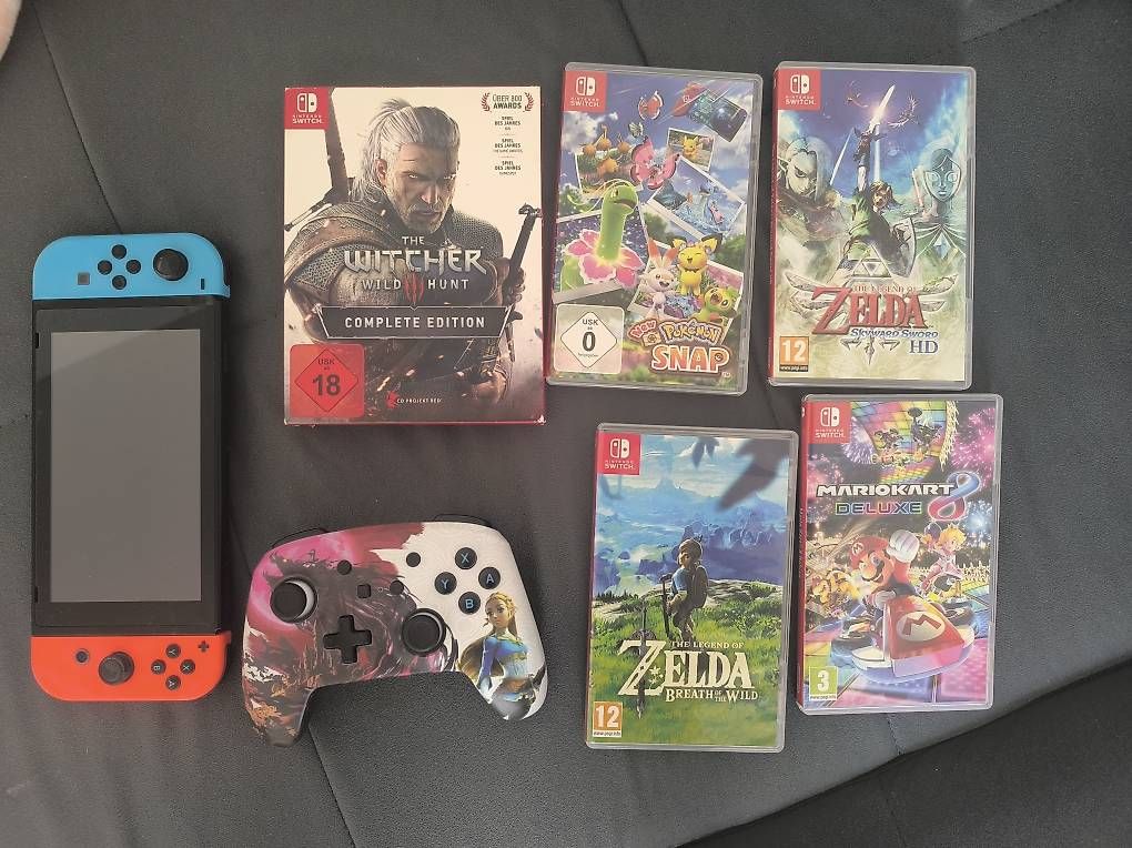 Consoles: Nintendo Switch + Controller + 5 Spiele – D'occasion à Schaffhausen par Beastware