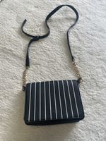 Sac à bandoulière rayé noir et blanc - Tendance