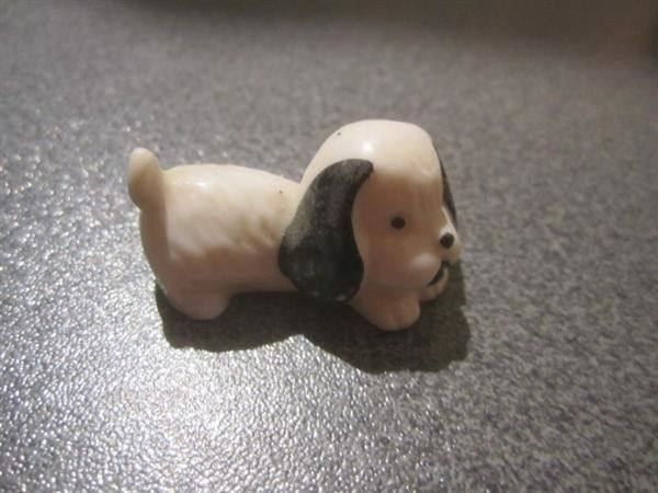 Statuette: Hund liegend schwarz/weiss – Usato da Zürich venduto da Motzkuh