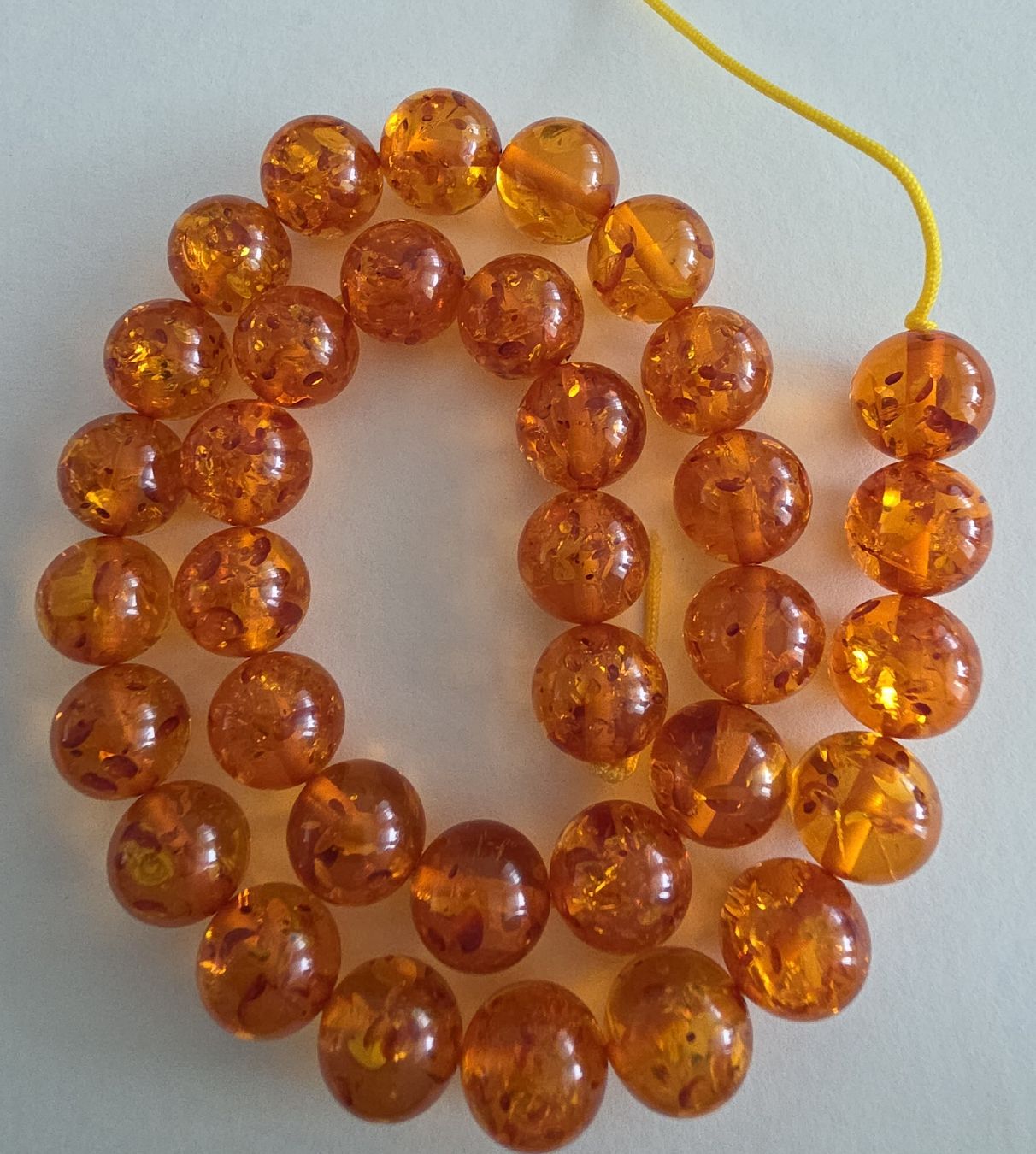 Minerali & Pietre curative: Bernstein 12mm. gelb/orange Strang – Nuovo e nell'imballaggio originale da Menziken venduto da Mirager 1