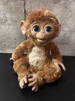 la célèbre peluche interactive Cuddles My Giggly Monkey
