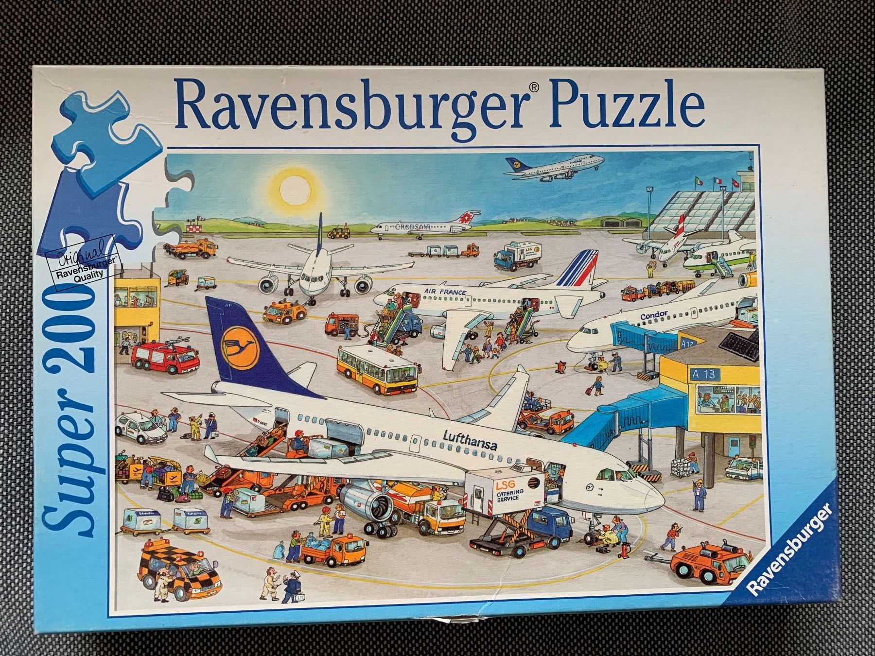 Ravensburger Puzzles: Ravensburger Puzzle "Auf dem Flughafen" – Gebraucht aus Birmensdorf ZH von eva.bari 1