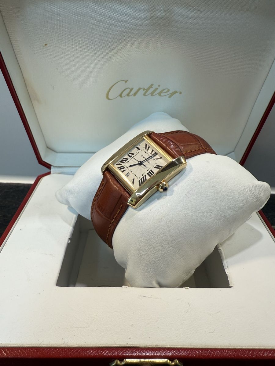 Cartier Orologi: Cartier Tank 18K Automatic – Usato da Zürich venduto da WATCHROOM 2