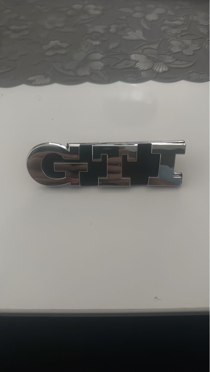 VW Tutti pezzi di ricambio auto: VW GTI Emblem - Chrom & Schwarz - Neu – Nuovo e nell'imballaggio originale da Pieterlen venduto da Adi.88