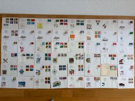Briefmarken auf 48 Couverts (davon 40 Ausgabetag)