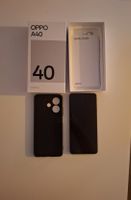 Smartphone Oppo A40 noir état d'usage avec emballage.