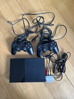 PlayStation 2 Konsole mit 3 Spielen und 2 Controllern