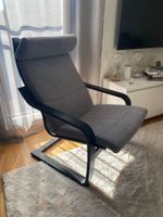 Fauteuil gris/noir bon état.