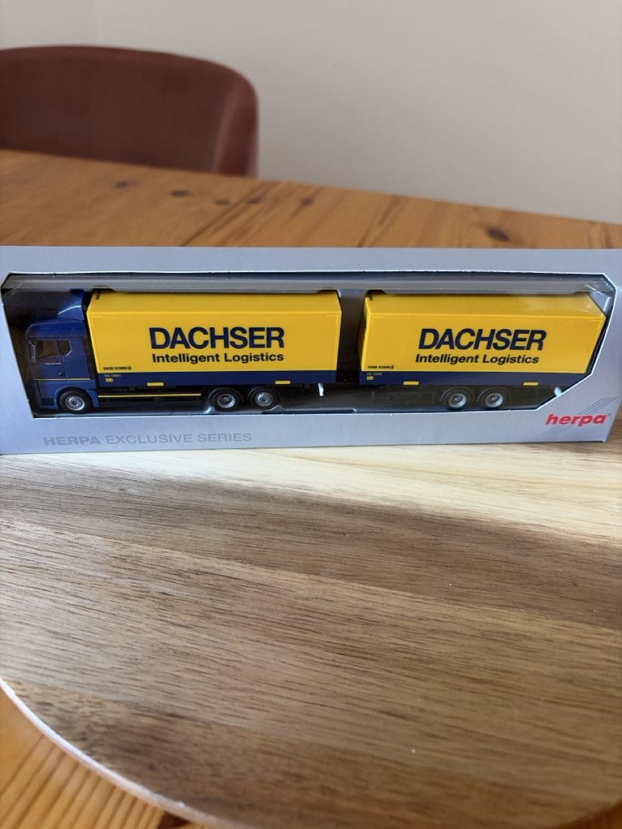 Herpa Kit di modellismo & Modellini statici: MAN TGX von Dachser  – Nuovo e nell'imballaggio originale da Ebikon venduto da MiaSophia01