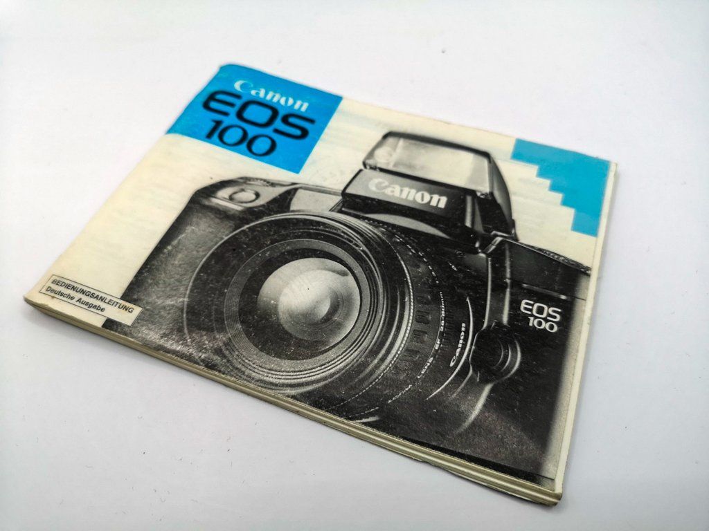 Canon Fotocamera: Canon EOS 100 analoge Kamera mit Objektiv – Usato da Sargans venduto da Botanico 7