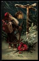 Weihnachtsmann mit Laterne am verschneit