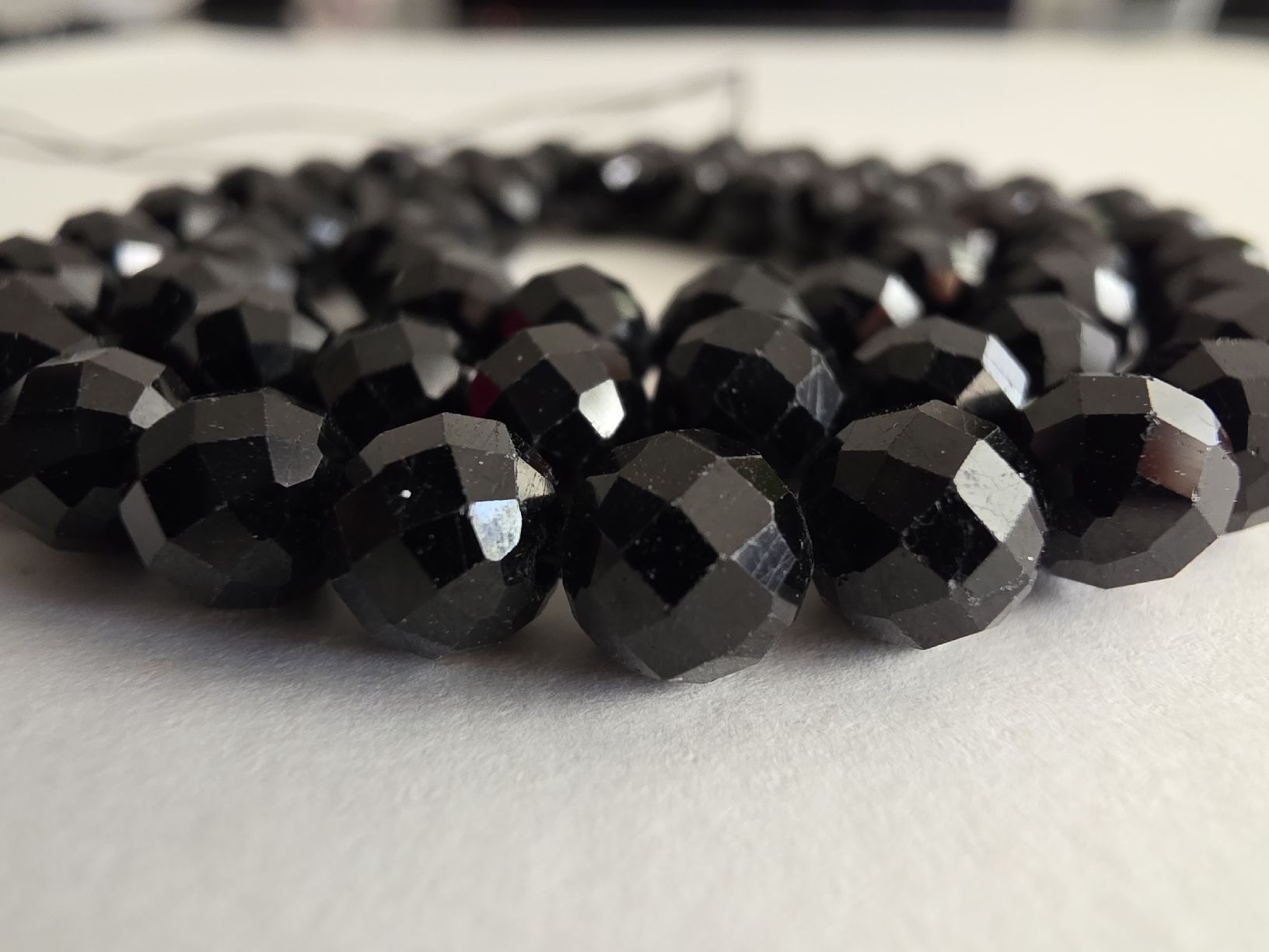 Minerali & Pietre curative: Turmalin facettiert 6mm. Strang 38cm. – Nuovo e nell'imballaggio originale da Menziken venduto da Mirager