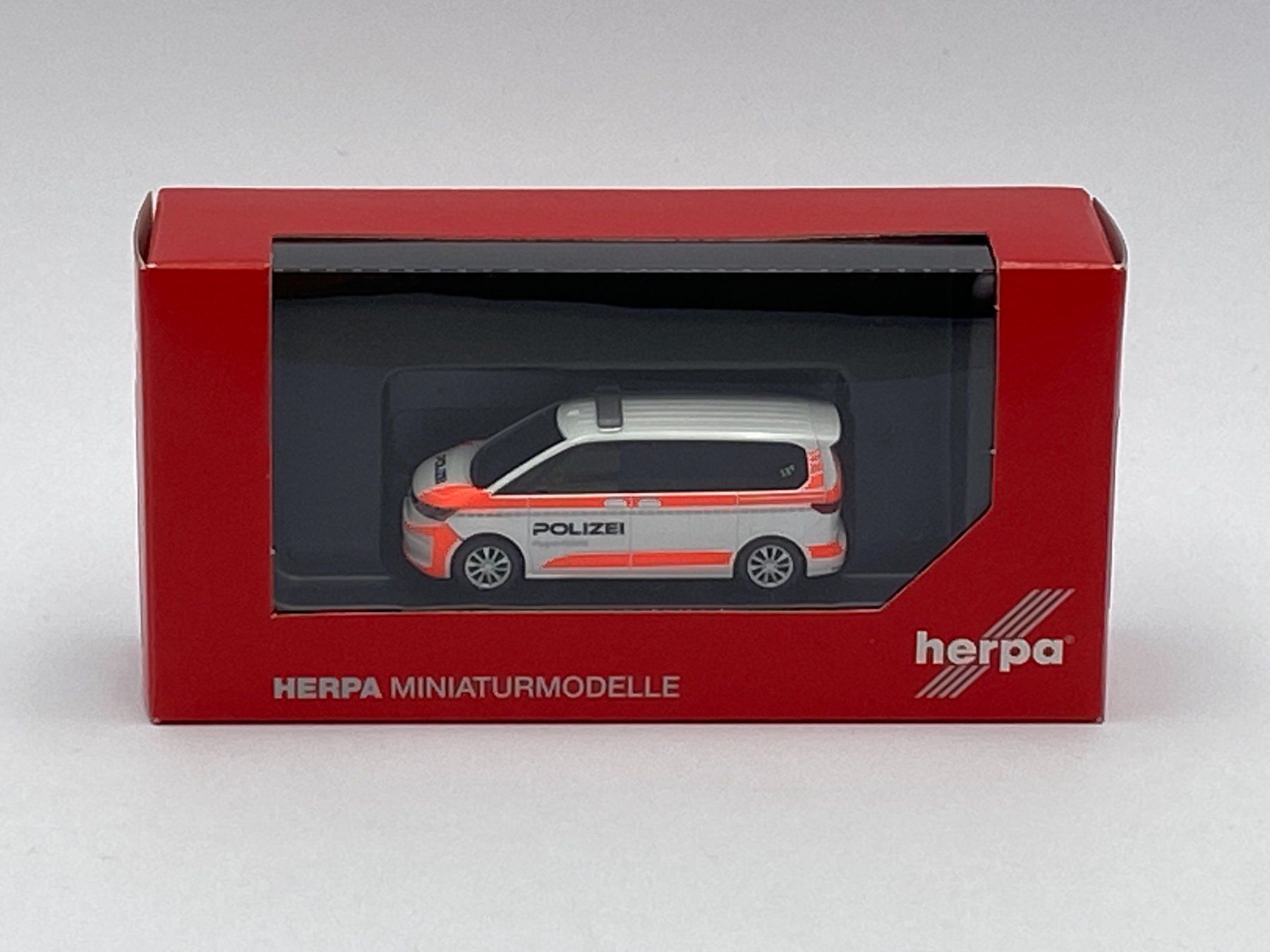 Volkswagen Modellini d'auto: Herpa 98496 1:87 VW Multivan Polizei Schweiz – Nuovo e nell'imballaggio originale da Neukirch an der Thur venduto da MoBa-Artikel 2