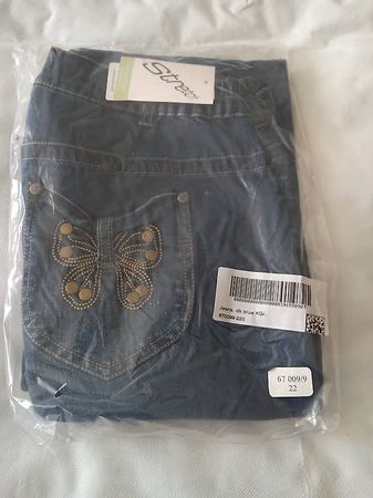 Jeans neuf papillon