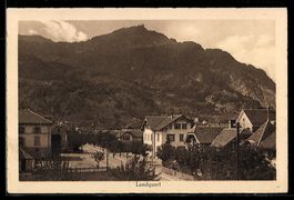 AK Landquart, Straße mit Häusern und Bergpanorama