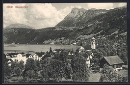 Beckenried, Ortsansicht mit See und Berg