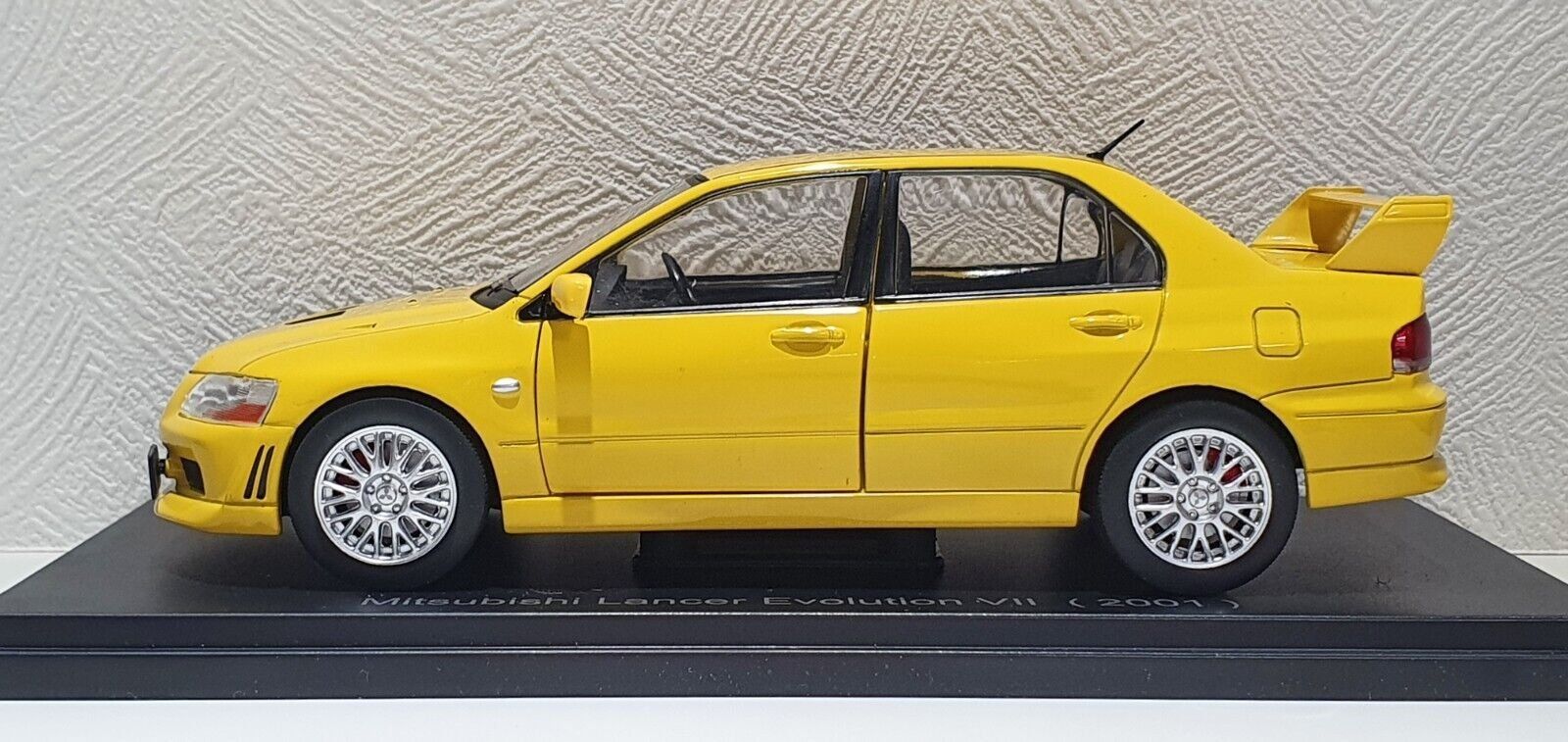 Mitsubishi Modellautos: Mitsubishi Lancer Evolution VII 2001-2004 RHD gelb      1:24 – Neu und originalverpackt aus Gerlafingen von espero88 1