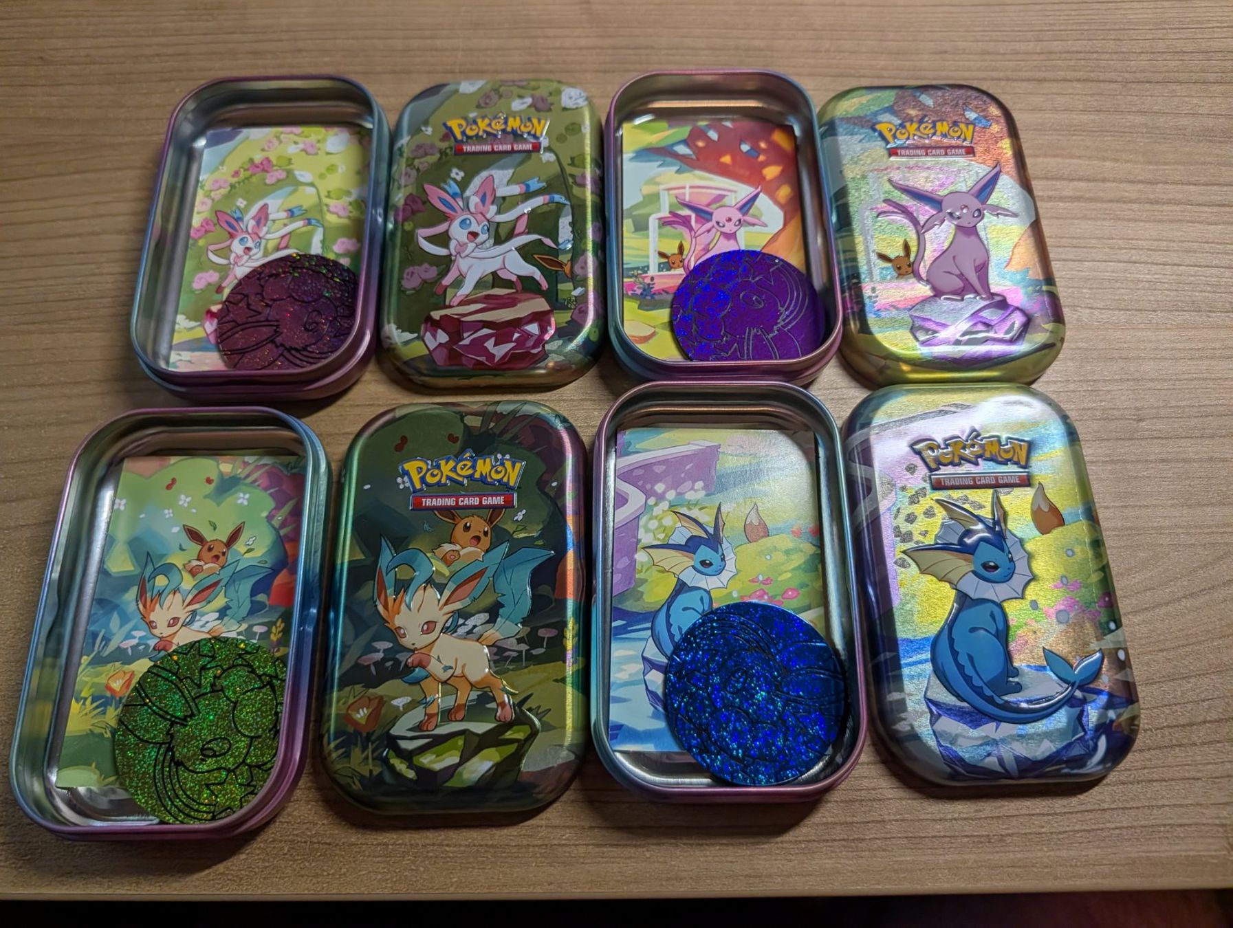 Giochi: Pokémon Prismatic Evolutions Mini Tins Set (8/8) - EMPTY – Usato da Glattpark(Opfikon) venduto da fnhabach 1