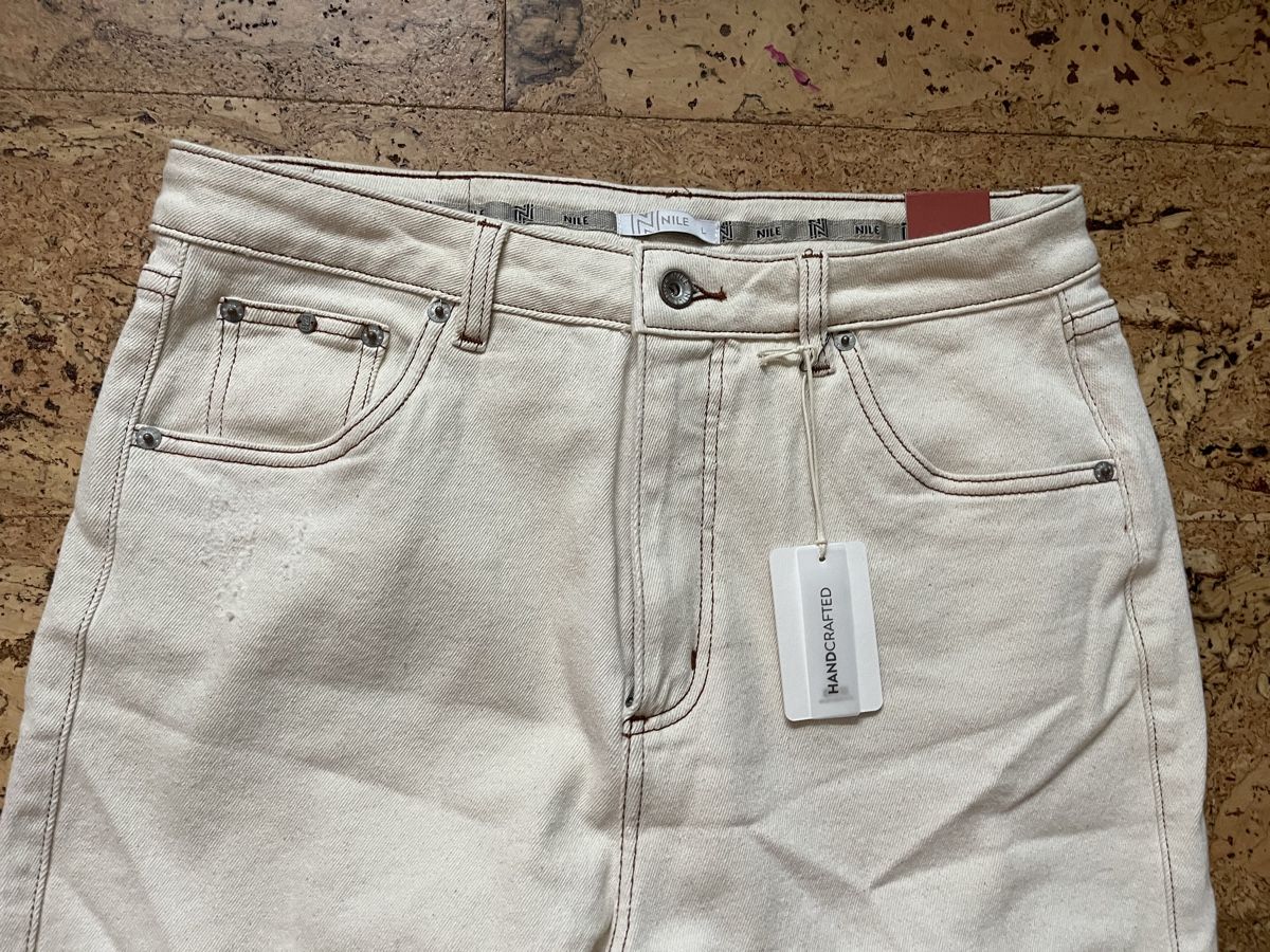 Nile Jeans: Neue Nile Hose Jeans beige L – Nuovo e nell'imballaggio originale da Täuffelen venduto da Nice800 1