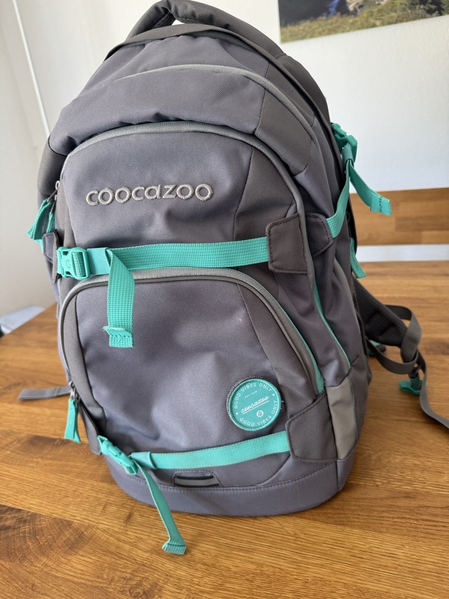 Coocazoo Zaini: Rucksack Coocazoo Mate grau türkis – Usato da Kappel SO venduto da Musikant79