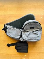 The Tushbaby™ Hip Carrier including waistband extender