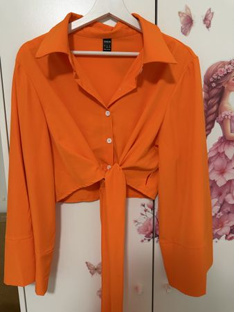 Schickes orangefarbenes Blusentop mit Schleife, Grösse L neu