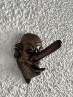 alte Wandmaske / Haken / Bronze