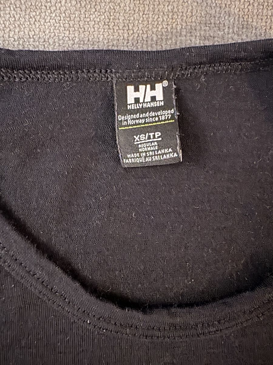Top: Helly Hansen Merino Baselayer, XS, Schwarz – Usato da Wimmis venduto da rimnakit 1