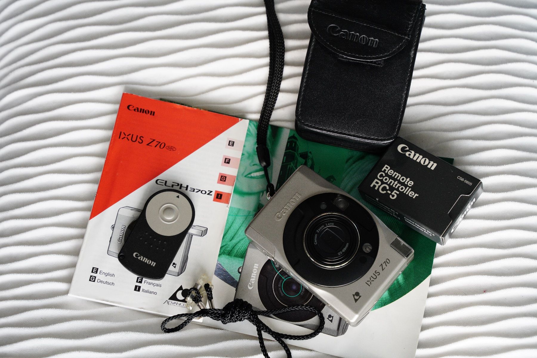 Canon Kamera: Nanon IXUS Z70 - 23-69mm + Remote Controller RC-5 – Defekt aus Dagmersellen von sim_zqh8