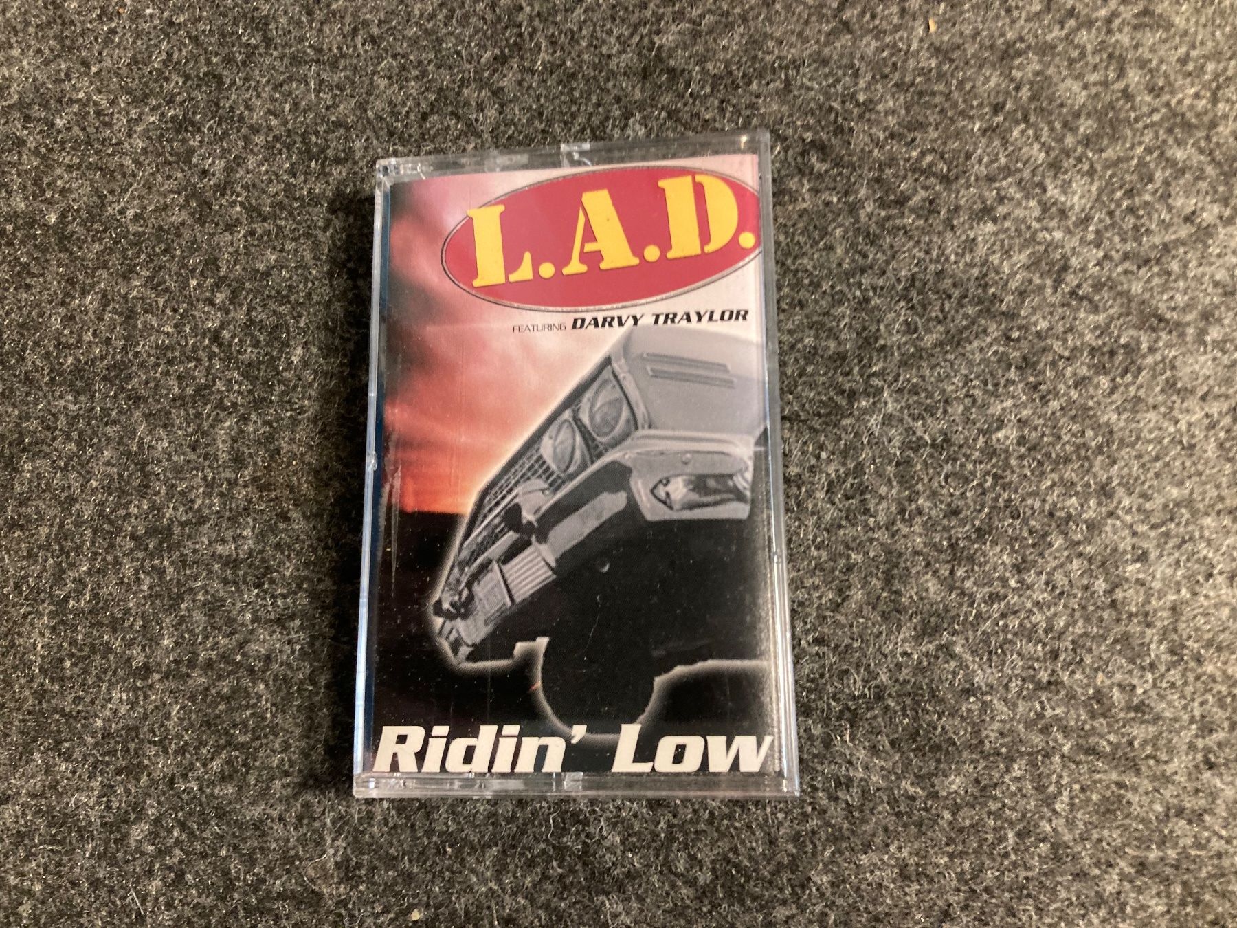 Musicassette: L.A.D. Featuring Darvy Traylor - Ridin' Low (MC) – Usato da Fribourg venduto da Karushi