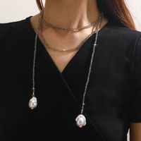 Elegante lange Halskette mit Barockperlen, neuwertig!