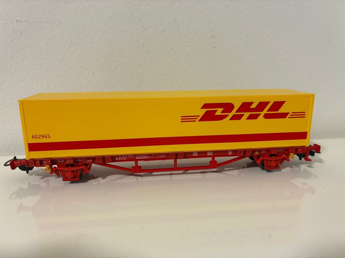 Piko Modelleisenbahnen: Wagen DHL Piko – Gebraucht aus Stans von lor_p8xh