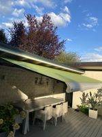 Gelenkarmmarkise grün für Terrasse gebraucht