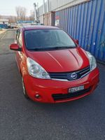 Nissan Note rouge, spacieuse et fiable!