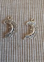 2x Charm Anhaenger Mondgesicht