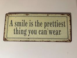 Blechschild - A smile is the prettiest thing you can wear