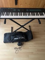jamaha dx 27.  mit ständer und tragtasche