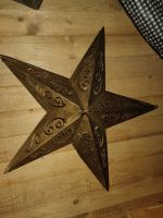Goldiger Metallstern
