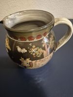 Bemahlter Milchkrug