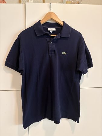 Polo Lacoste bleu marine taille L