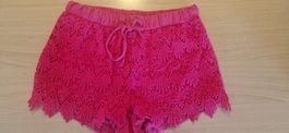 Short rose fuchsia en dentelle ajourée taille M/L