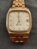 Omega Seamaster Quarzuhr, goldfarben,Beschreibung lesen