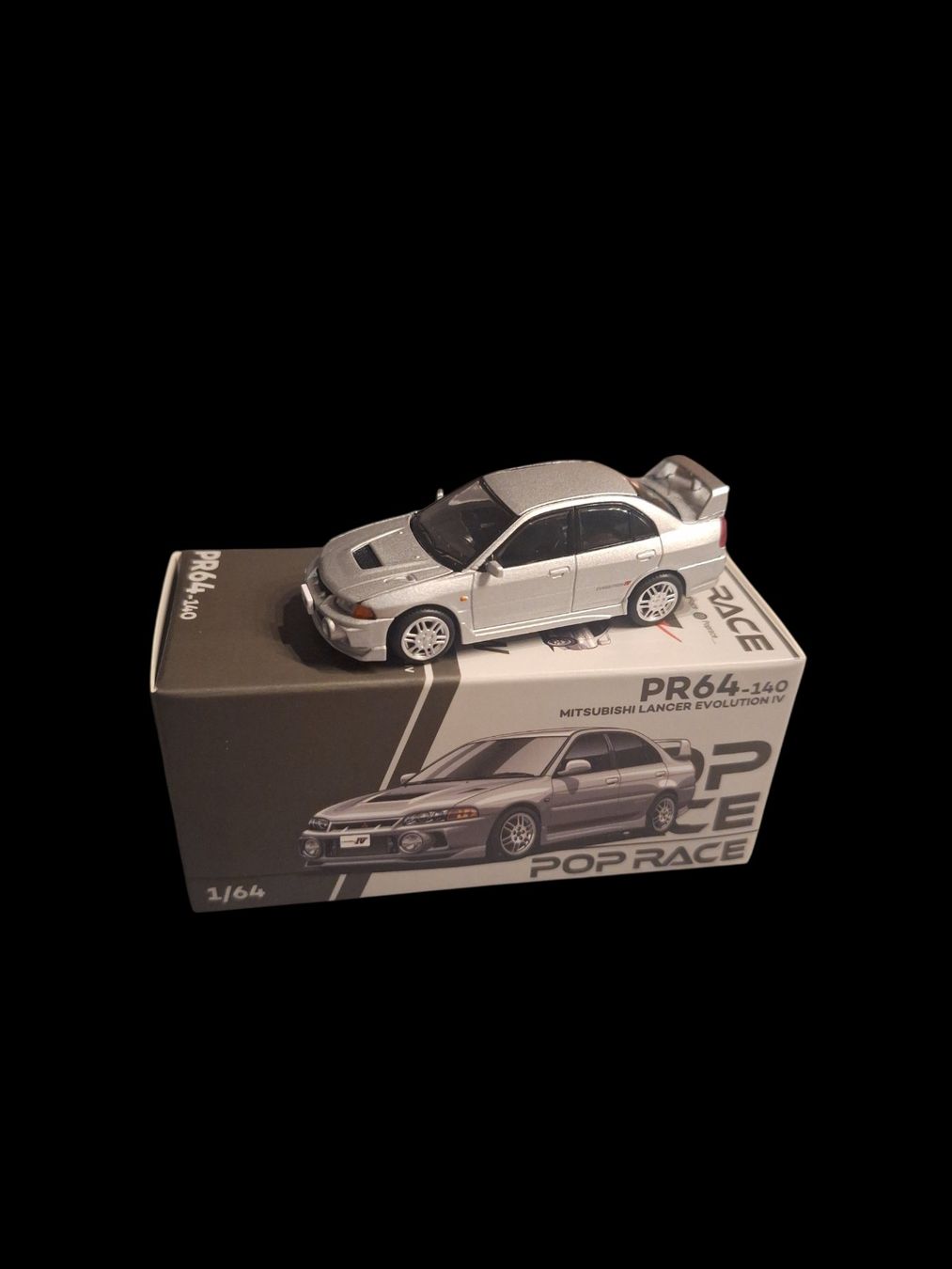 True Scale Miniatures Modellini d'auto: Pop Race Mitsubishi Lancer Evolution IV PR64-140 – Nuovo e nell'imballaggio originale da Adlikon venduto da Mmartin0