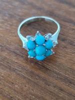 Goldring mit Türkisen und Weisen Saphire