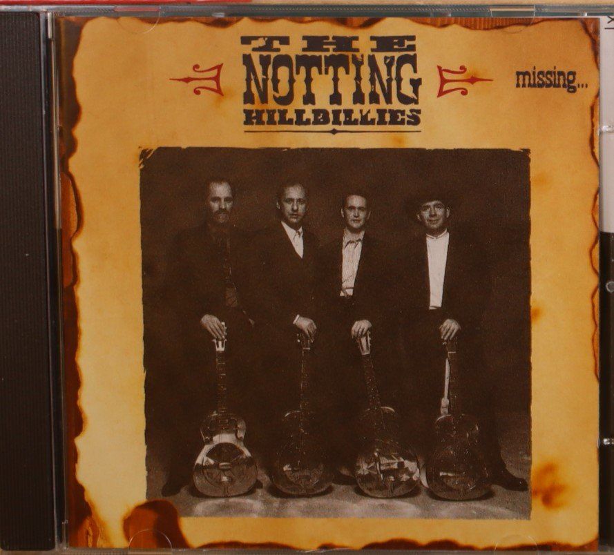CDs: The Notting Hillbillies – Missing... – D'occasion à Luzern par CONTENTI